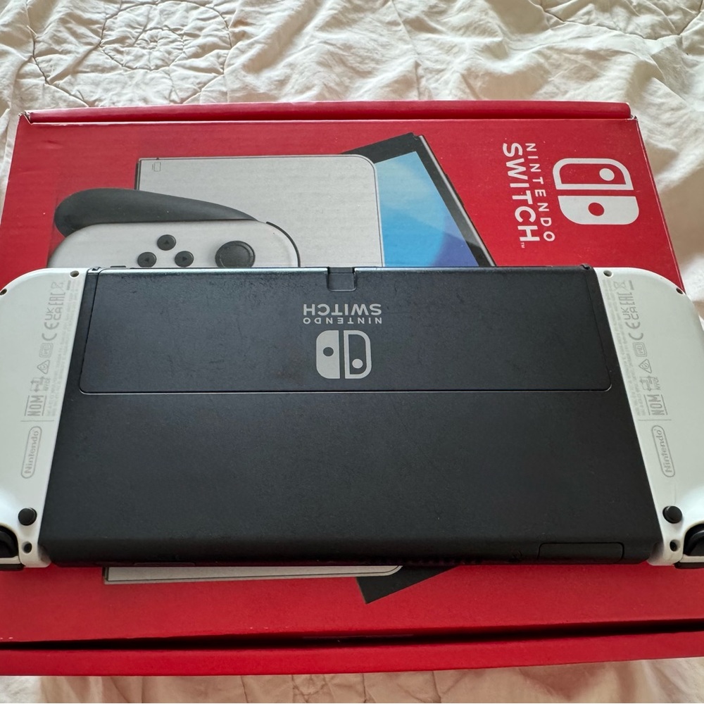 Nintendo Switch OLED with White and Black Joy-Cons - Picture 3 of 3